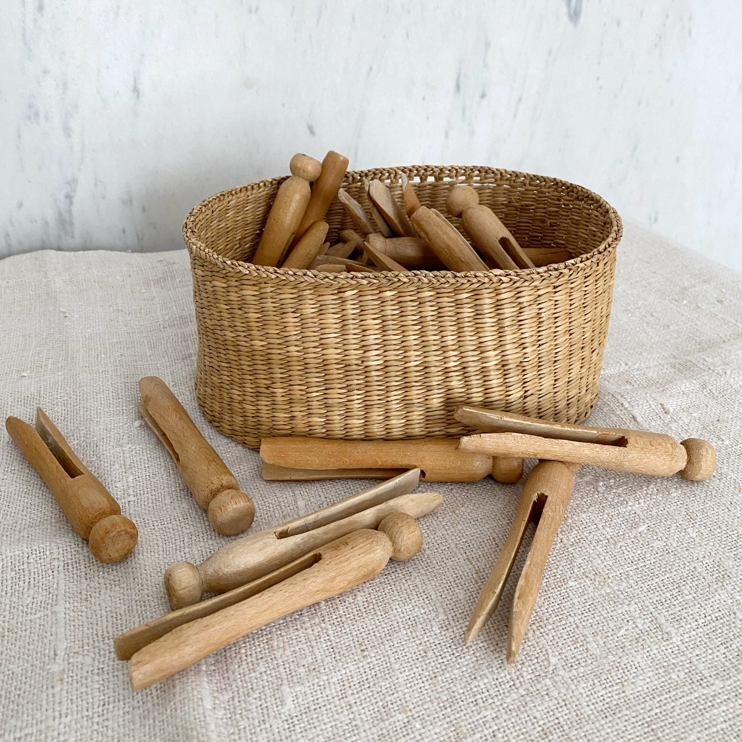 Collection of Vintage Wood Clothespins in Basket