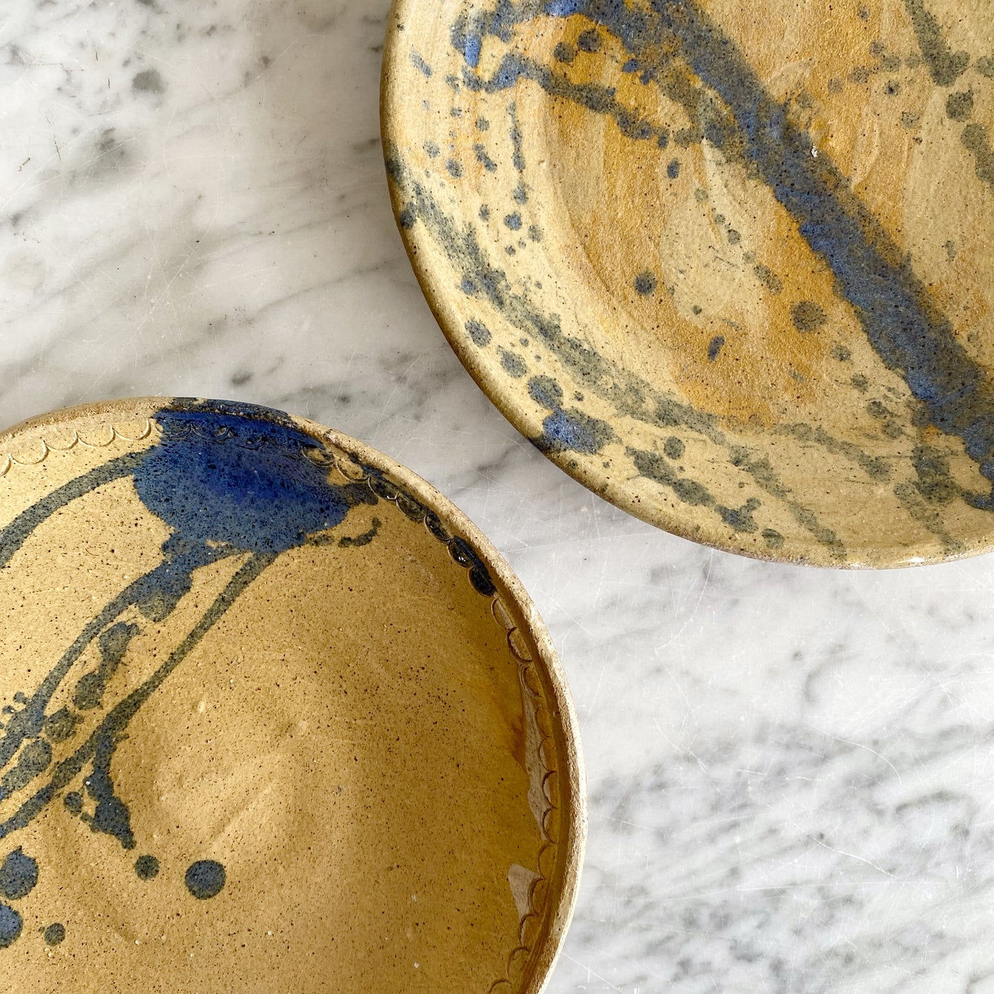 Vintage Pottery Plate with Blue Splatter Design