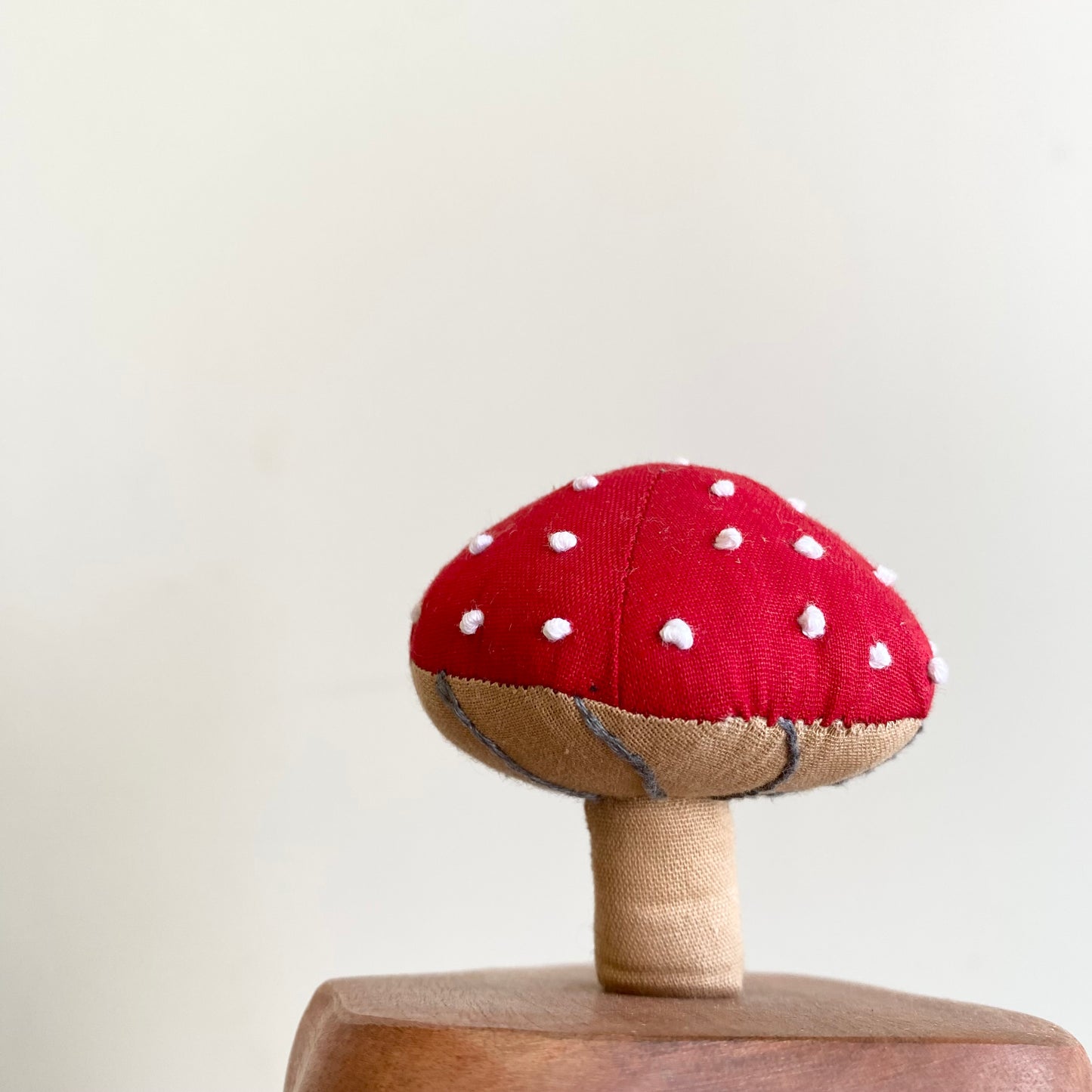 Plush Mushroom on Wooden Stand