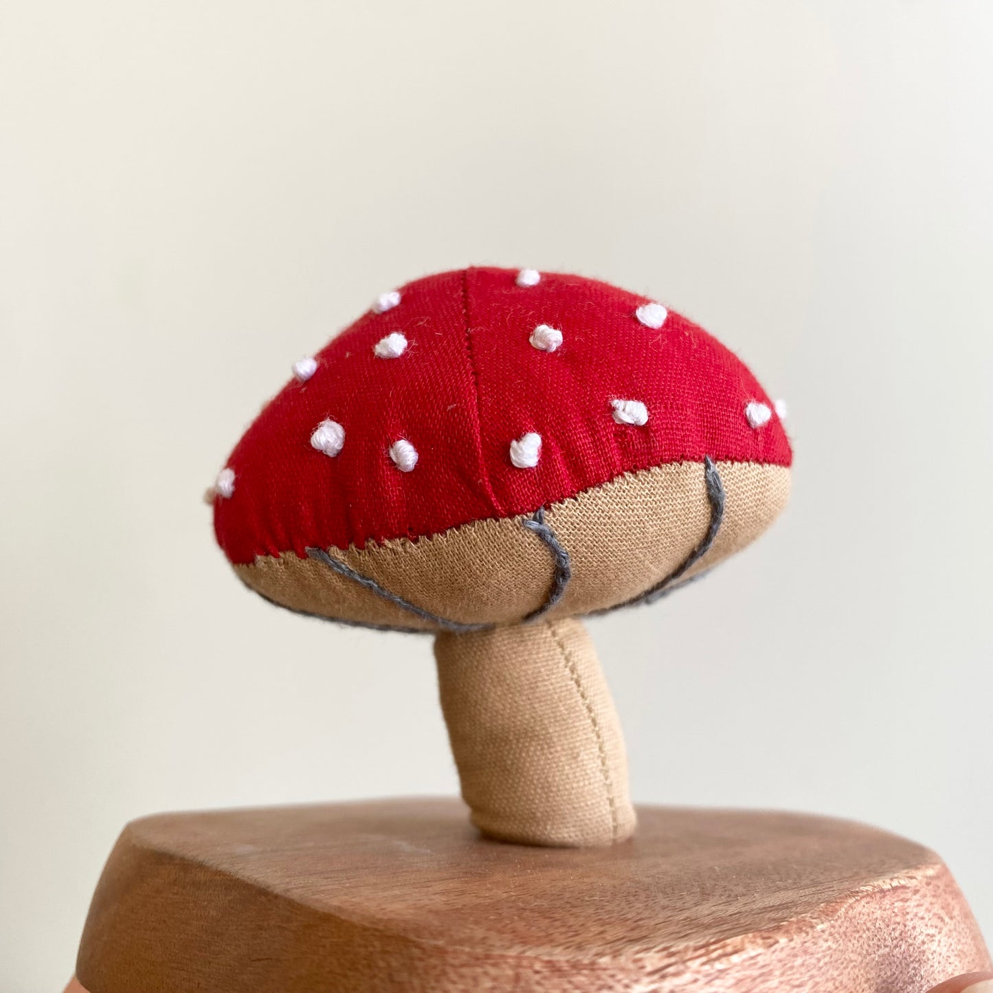 Plush Mushroom on Wooden Stand