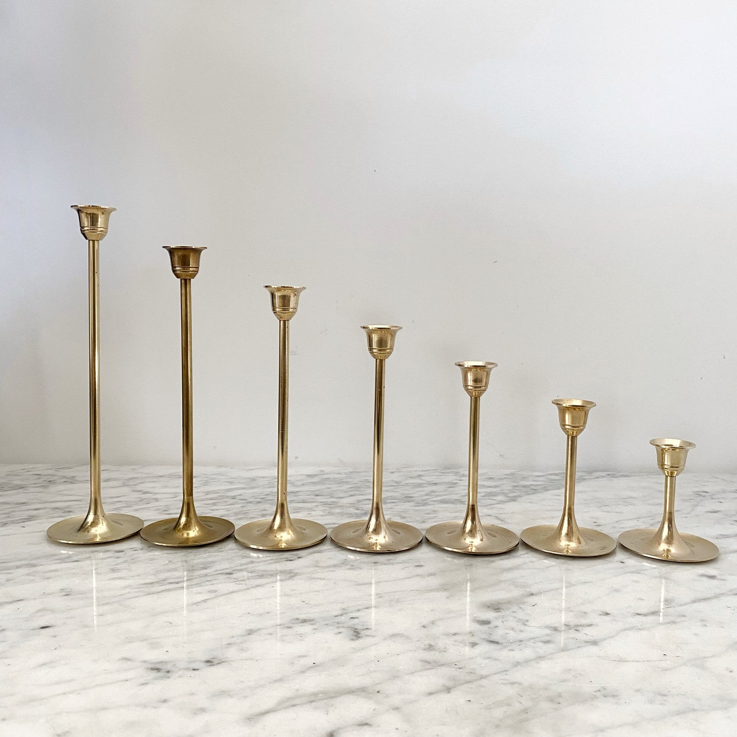 Collection of 7 Vintage Slender Brass Candlestick Holders