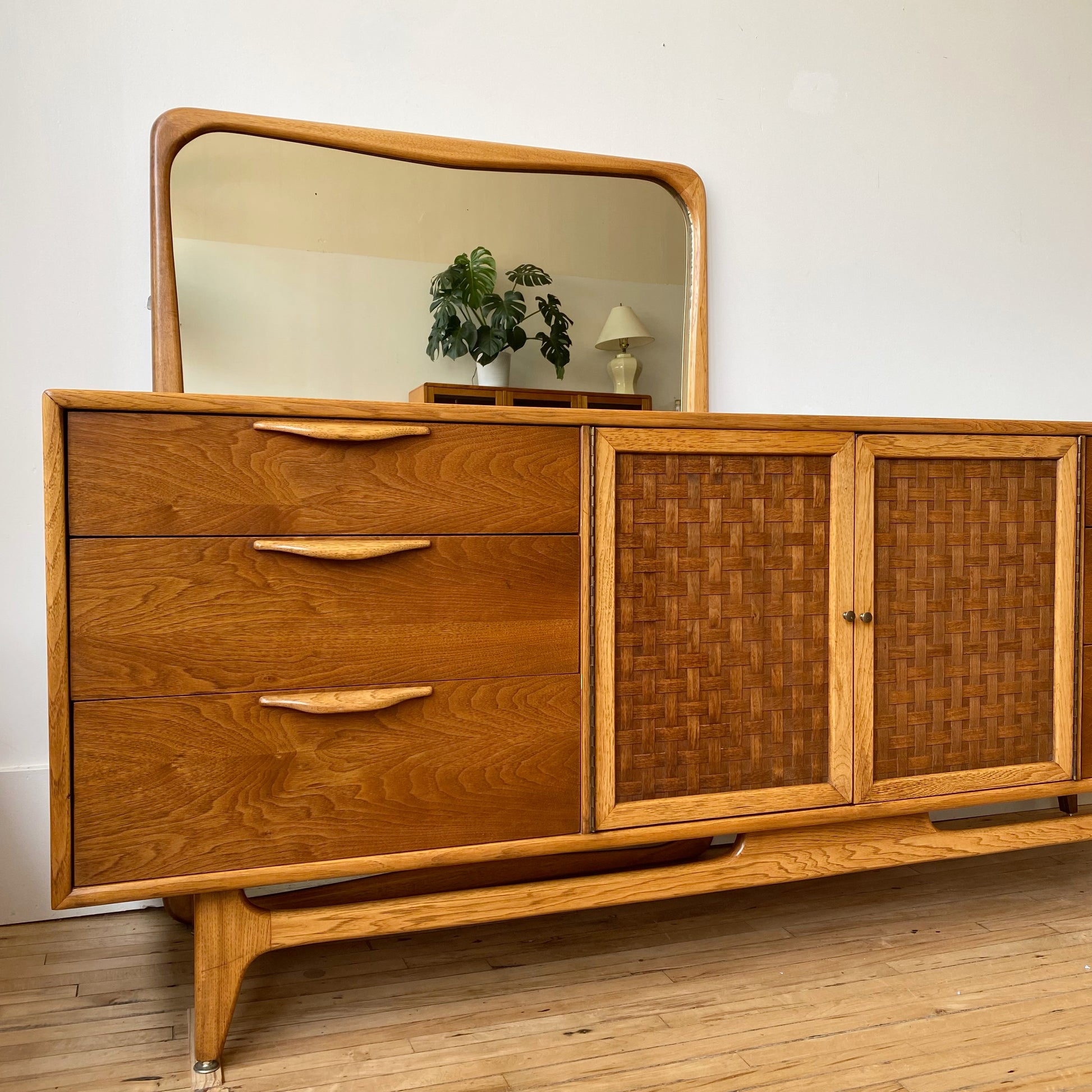 mid century modern dresser with mirror Walnut 9-drawer & by Jack Cartwright - Midcentury Dressers & Chests For Sale The tapered legs are accented with gold capped tips Bassett Furniture Mid-Century Modern 6