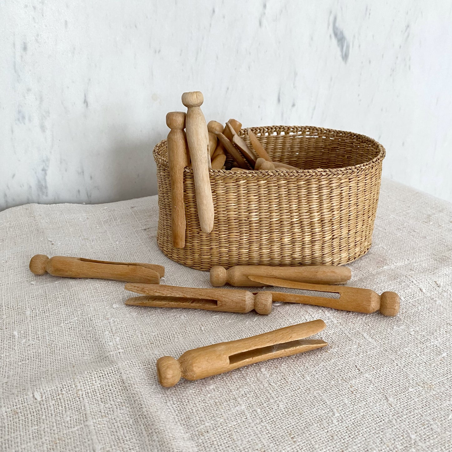 Collection of Vintage Wood Clothespins in Basket