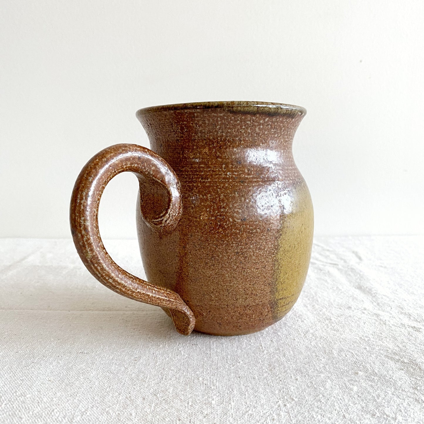 Handcrafted Pottery Pitcher with Yellow Detail