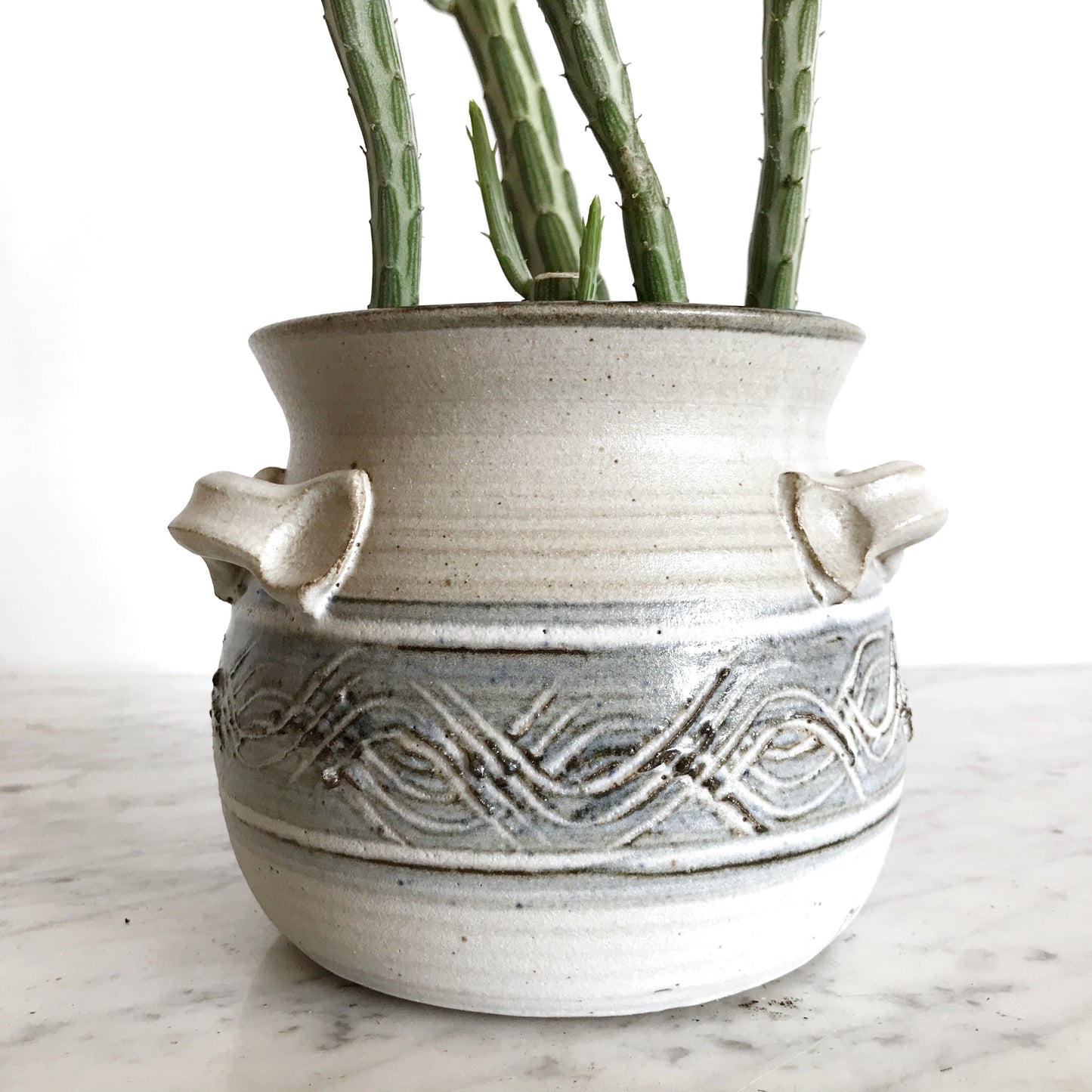 Vintage Pottery Vessel with Waves