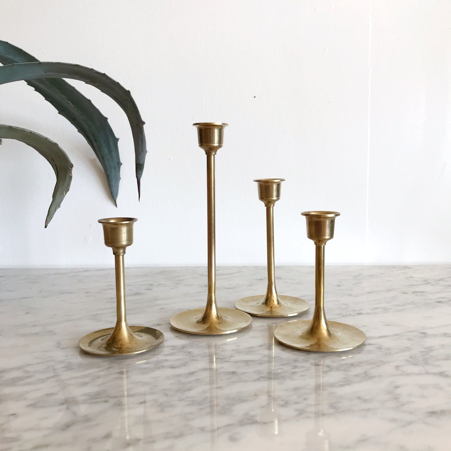 Set Of 4 Slender Brass Candle Holders
