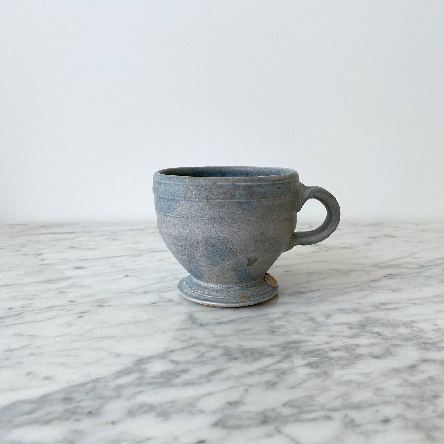 Handcrafted Footed Pottery Mug